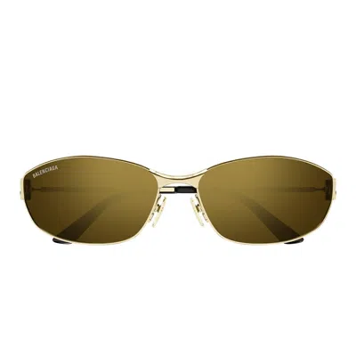 Shop Balenciaga Sunglasses In Gold