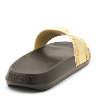 Shop Versace Flat Shoes In Black-gold