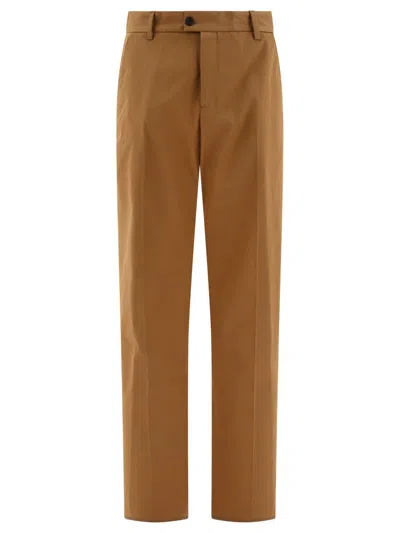Shop Alexander Mcqueen Tailored Trousers With Back Logo In Brown