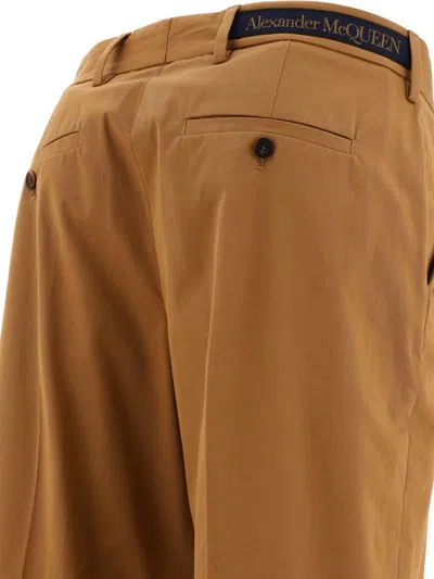 Shop Alexander Mcqueen Tailored Trousers With Back Logo In Brown