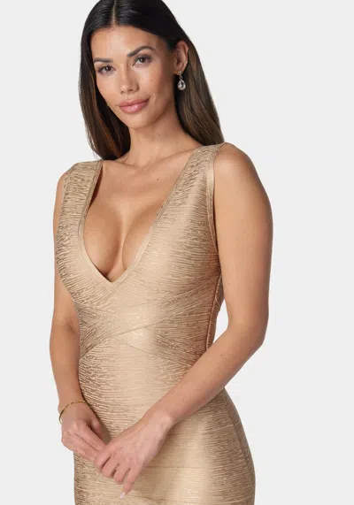 Shop Bebe Foiled Bandage Metallic Dress In Champagne