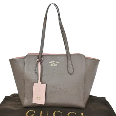 Shop Gucci Swing Brown Leather Shoulder Bag ()