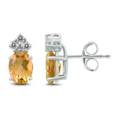 Shop Sselects 14k 8x6mm Oval Citrine And Three Stone Diamond Earrings In Orange