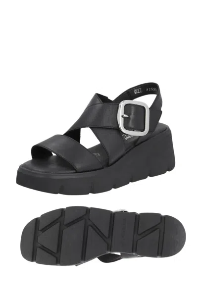 Shop Rieker Women's Evolution Wedge Sandal In Black In Grey