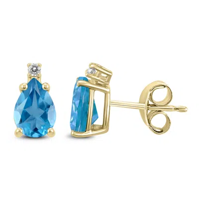 Shop Sselects 14k 7x5mm Pear Topaz And Diamond Earrings In Blue