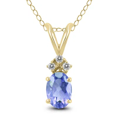 Shop Sselects 14k 5x3mm Oval Tanzanite And Three Stone Diamond Pendant In Blue