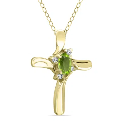 Shop Sselects Peridot Cross Diamond Pendant 10k In Green