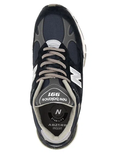 Shop New Balance 991 Sneakers Blue