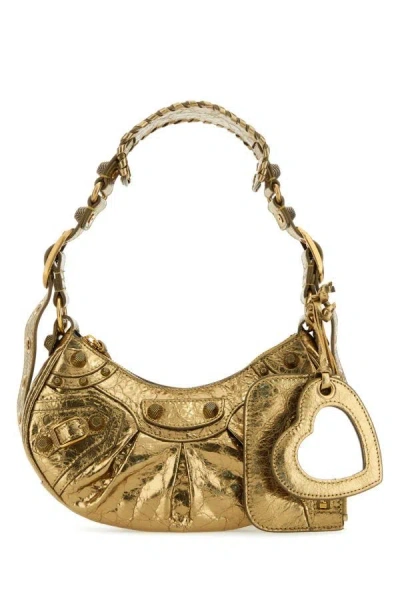 Shop Balenciaga Woman Gold Nappa Leather Le Cagole Xs Shoulder Bag