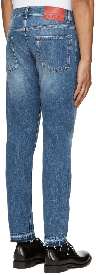 Shop Alexander Mcqueen Blue Denim Frayed Jeans