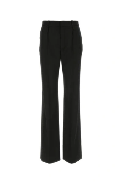 Saint Laurent Flared Tailored Wool Trousers In Black
