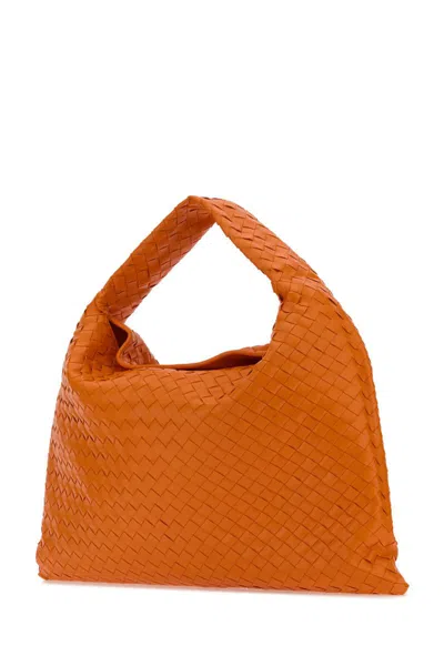 Shop Bottega Veneta Handbags. In Orange