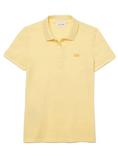 Shop Lacoste M/m Polo. Clothing In Yellow & Orange