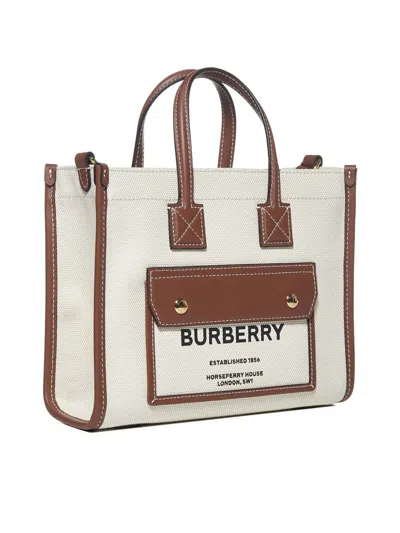 Shop Burberry Bags In Natural Tan