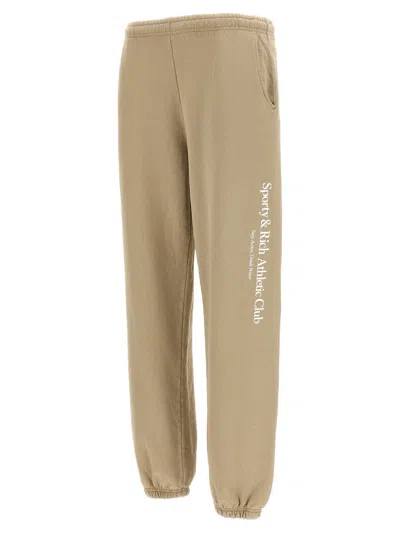 Shop Sporty And Rich Sporty & Rich 'athletic Club' Joggers In Beige