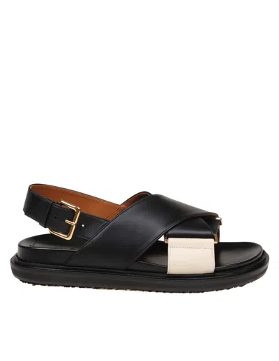 Shop Marni Crossed Leather Sandal In Black /white