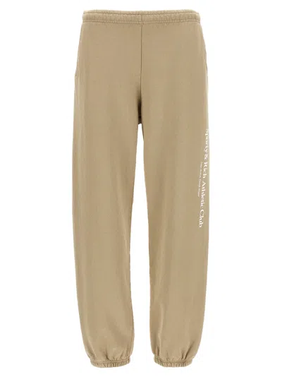 Shop Sporty And Rich Athletic Club Pants In Beige