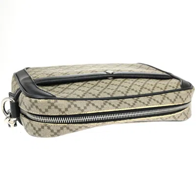 Shop Gucci Diamante Beige Canvas Clutch Bag ()