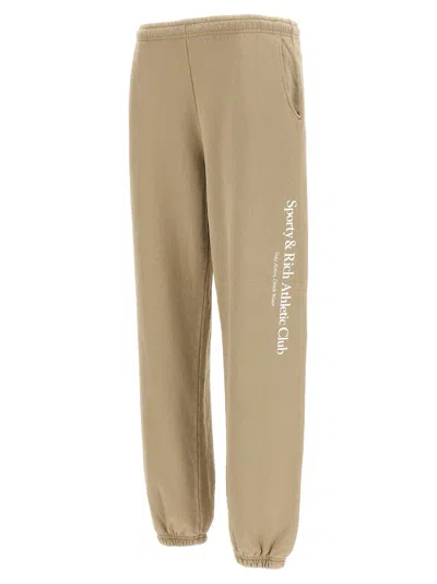 Shop Sporty And Rich Athletic Club Pants Beige