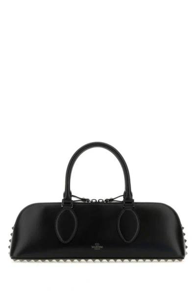 Shop Valentino Garavani Woman Black Leather Rockstud East-west Handbag