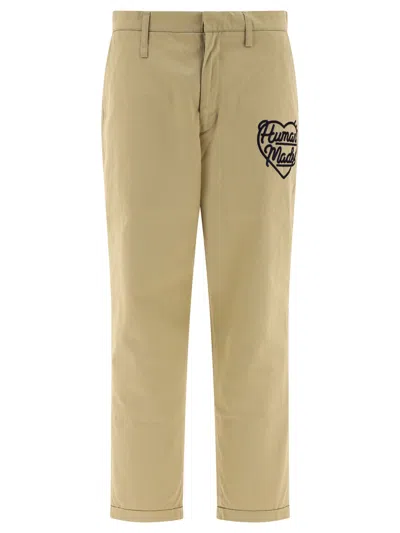 Shop Human Made Chino Trousers With Embroidered Logo In Beige