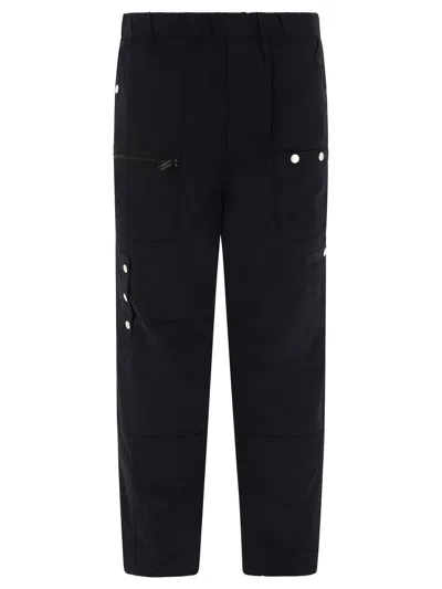 Shop Undercover Nylon Cargo Trousers In Black