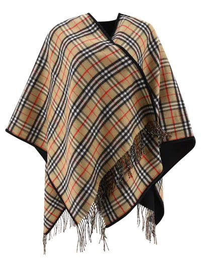 Shop Burberry Check Wool Reversible Cape In 黑色的