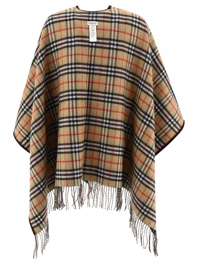 Shop Burberry Check Wool Reversible Cape In 黑色的