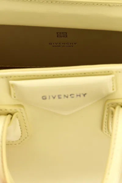 Shop Givenchy Women 'antigona Toy' Handbag In Yellow