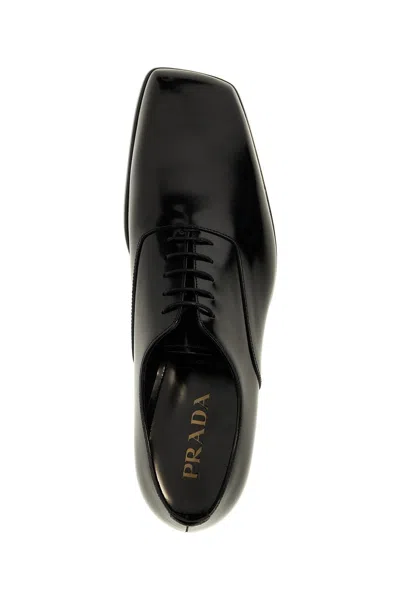 Prada Polished Leather Lace-up Shoes In Black