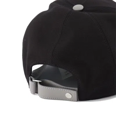 Shop Dior Baseball Cap In 黑色的