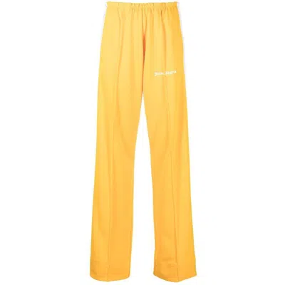 Shop Palm Angels Pants In Yellow