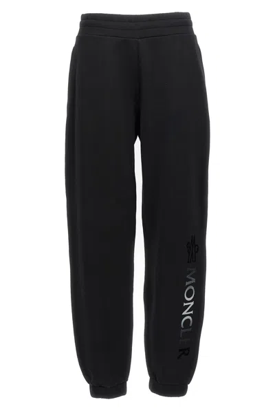 Shop Moncler Women Logo Patch Sweatpants In Black