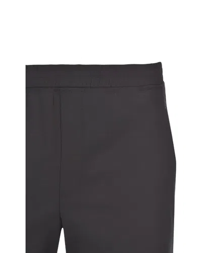 Shop Neil Barrett Trousers In Black