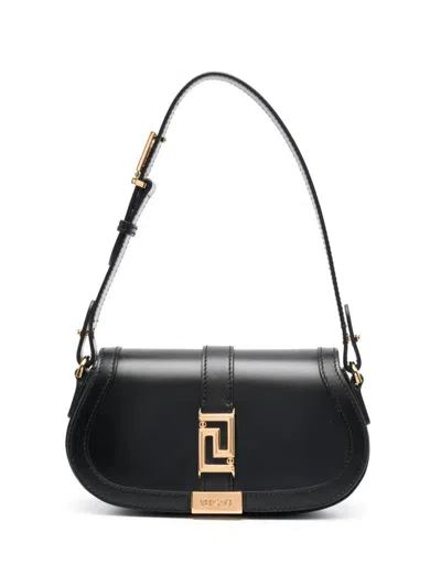 Shop Versace Mini Greca Goddess Shoulder Bag In Leather In Black
