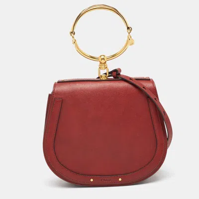 Shop Chloé Leather And Suede Medium Nile Bracelet Top Handle Bag In Red