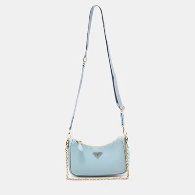 Shop Prada Light Saffiano Lux Leather Mini Re-edition Pochette Bag In Blue