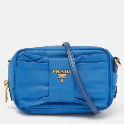 Shop Prada Nylon Mini Bow Crossbody Bag In Blue