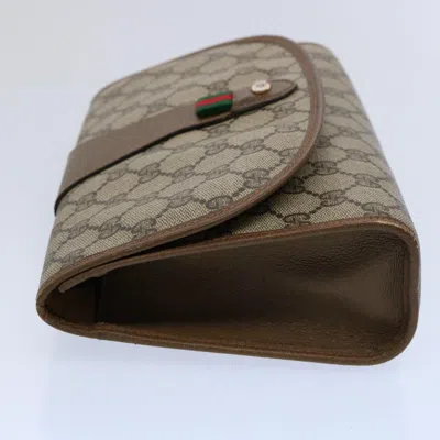 Shop Gucci Web Brown Canvas Clutch Bag ()
