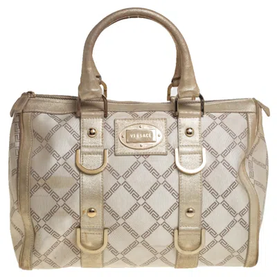 Shop Versace Metallic Gold/cream Signature Canvas And Leather Snap Out Of It Satchel