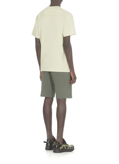 Shop Stone Island T-shirts And Polos Green