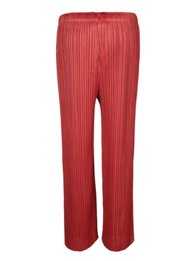 Shop Issey Miyake Trousers In Red