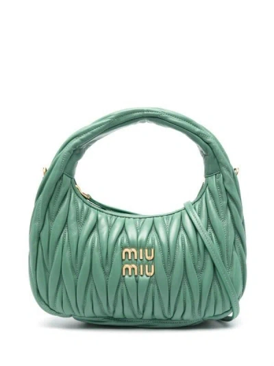 Shop Miu Miu Wander Matelassé Leather Mini Hobo Bag In Salvia