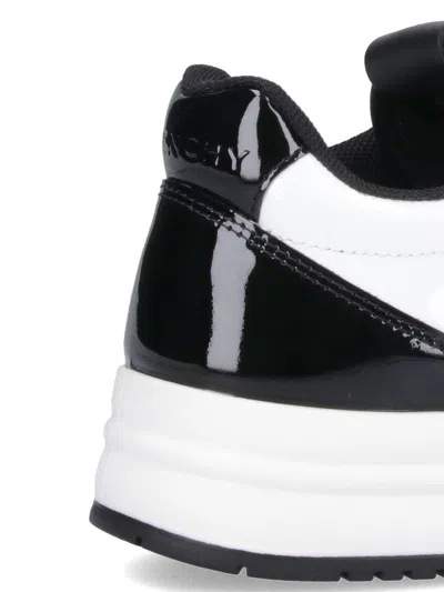 Shop Givenchy Sneakers In Blackwhite