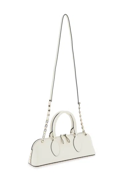 Shop Valentino Garavani Rockstud E/w Leather Handbag Women In Cream