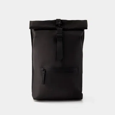 Shop Rains Backpacks In Black