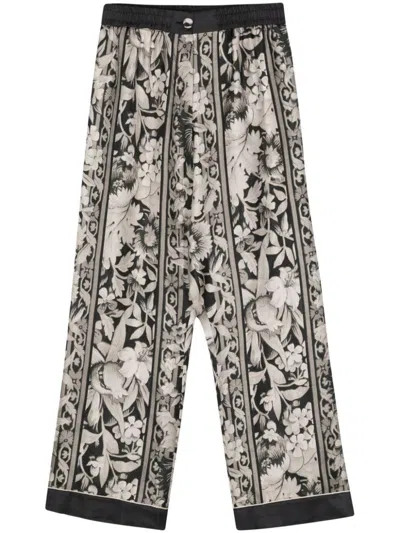 Shop Pierre-louis Mascia Printed Silk Trousers In Black