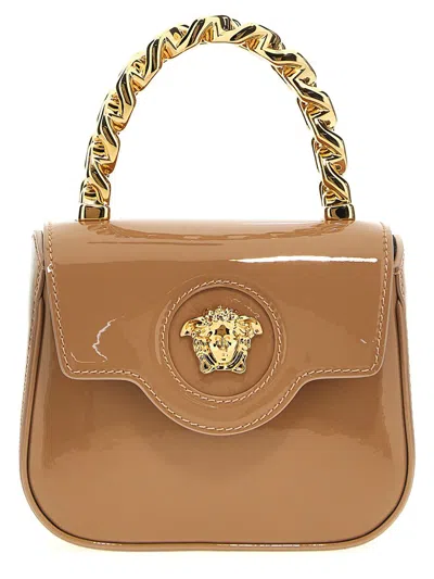 Shop Versace 'la Medusa' Mini Handbag In Beige