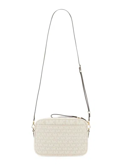 Shop Michael Kors Camera Bag Jet Set Charm In White