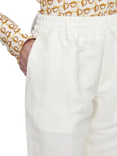 Shop Burberry Trousers In White
